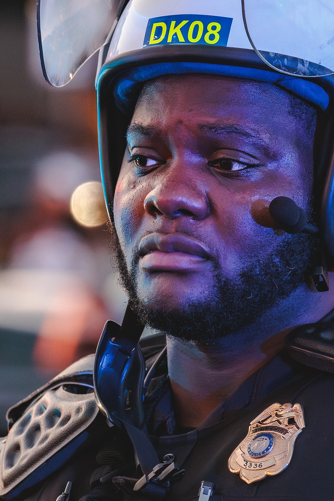 Atlanta police officer in riot helmet at an ICE protest photograph by Kevin Blackwell