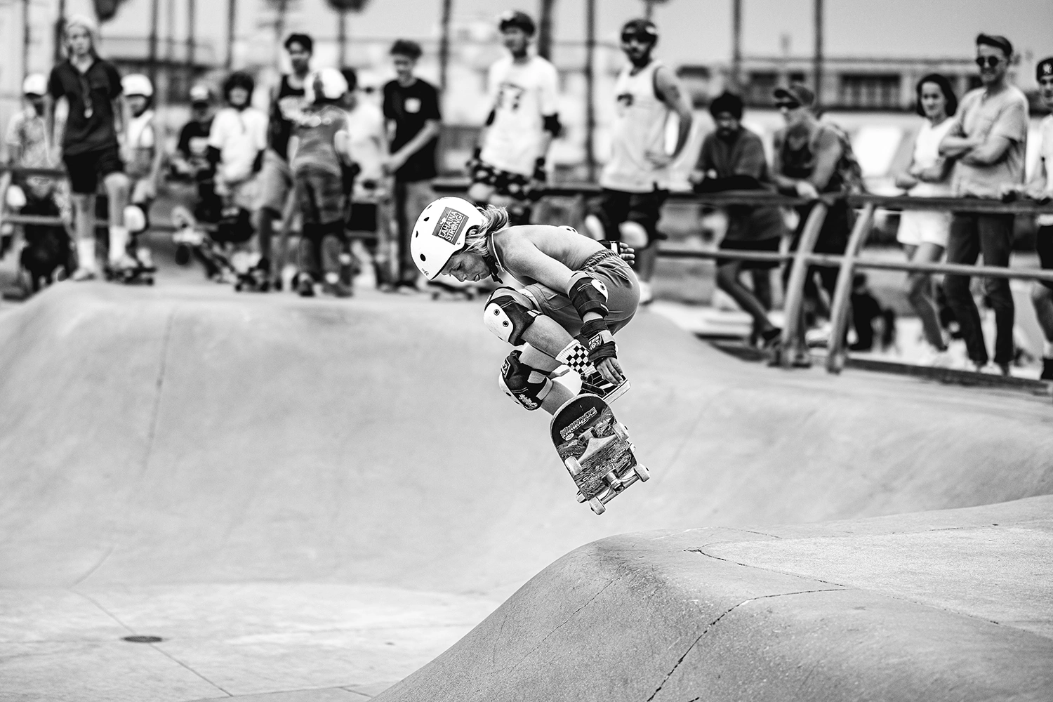 Skateboarder mid-trick, skateboarding photography by Kevin Blackwell